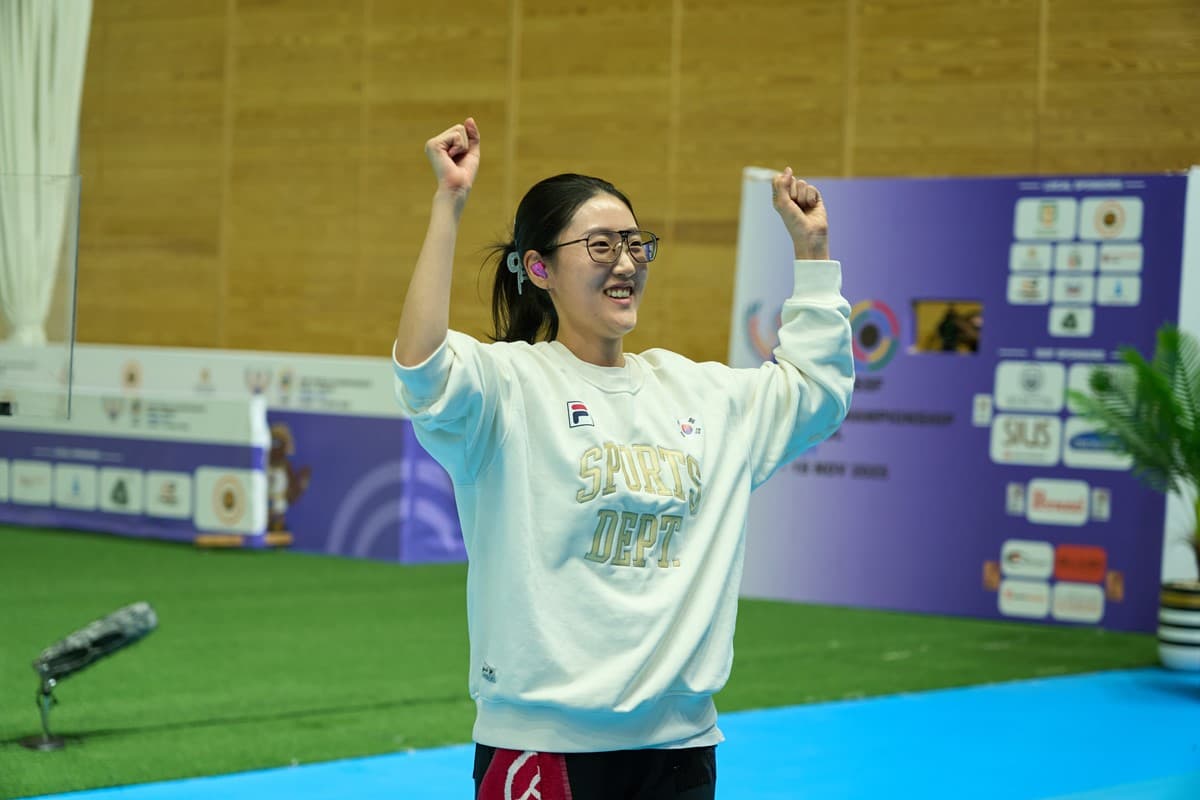Athlete celebrates after winning the women's 25m pistol title at the 2025 ISSF World Championship Rifle/Pistol